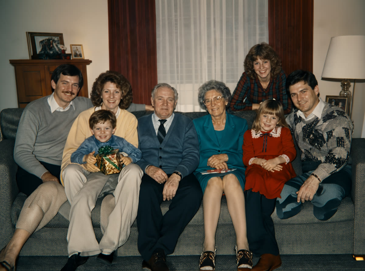 Flood damaged living room family photo restored with PhotoScanRestore after