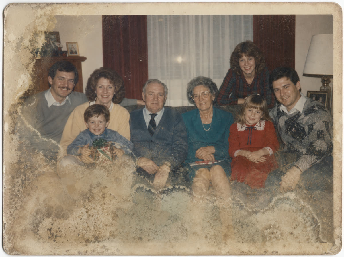 Flood damaged living room family photo restored with PhotoScanRestore before