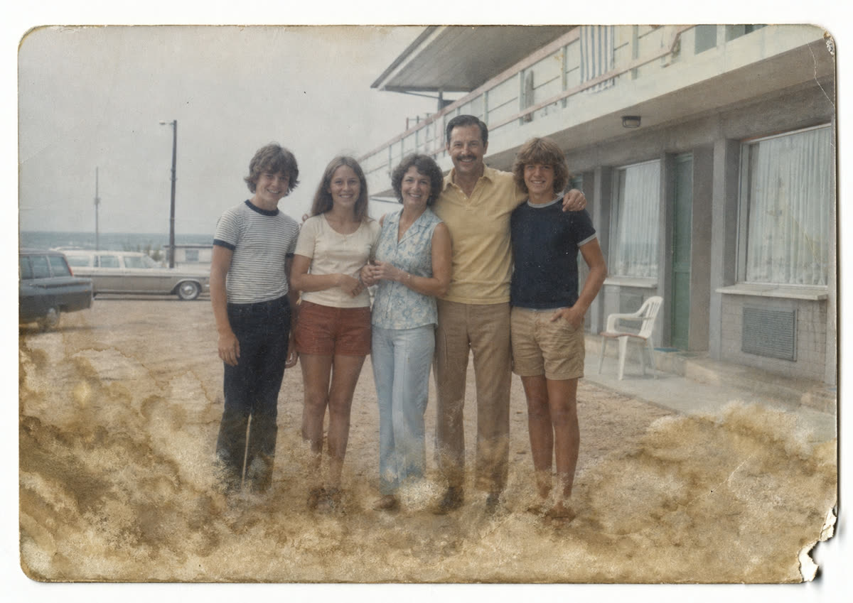 Water damaged seaside family photo restored with PhotoScanRestore before